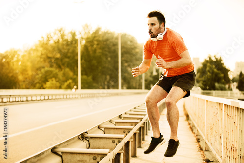 Man exercise on the bridge