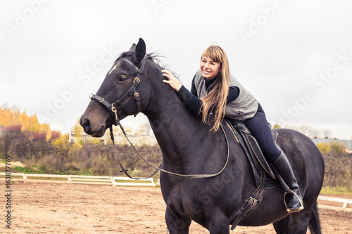 Girl and horse in a day