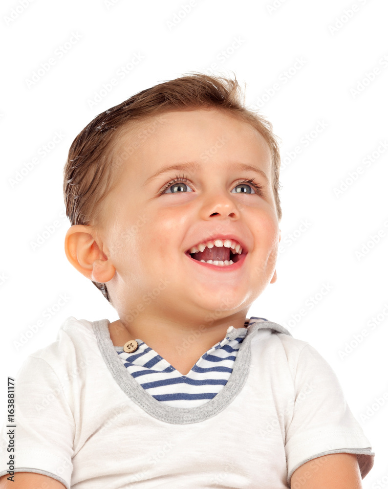 Beautiful little child with a beautiful smile looking up Beautiful little child with a beautiful smile looking up