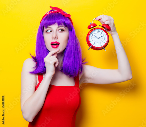 girl with purple color hair and alarm clock