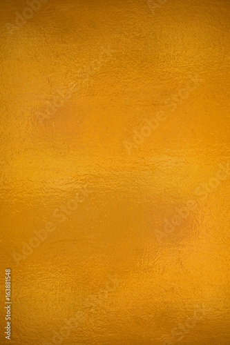 Glänzende goldene Oberfläche als Hintergrund
