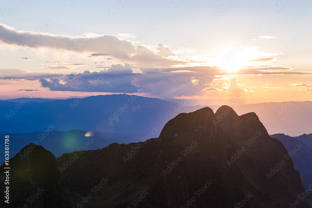 Sunset scene with silhouette mountain at Doi Luang Chiang Dao, Chiang Mai Province, Thailand Sunset scene with silhouette mountain at Doi Luang Chiang Dao, Chiang Mai Province, Thailand