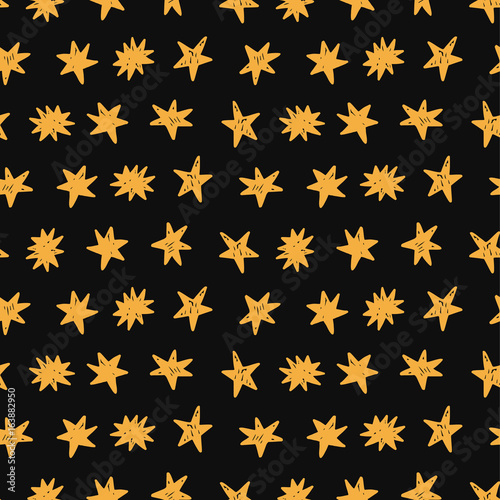 Golden stars seamless pattern on black background © Artrise Stocker