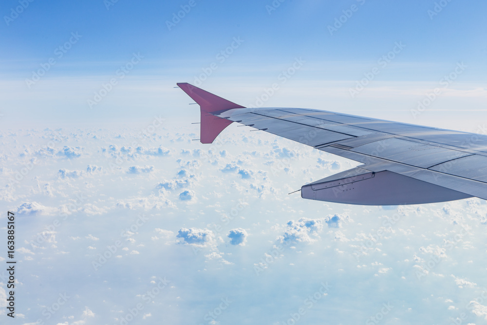 airplane wing and cloud airplane wing and cloud