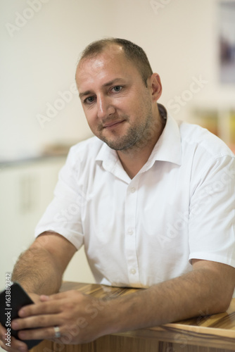 designer in his furniture manufacturing workshop
