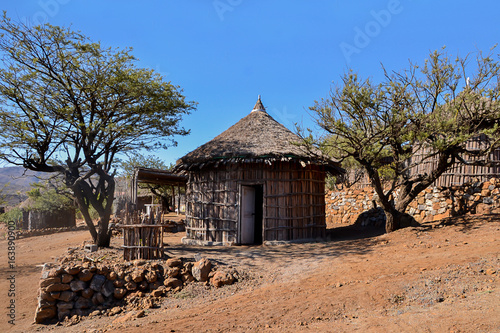 Typical rounded Djiboutian huts in a village in northern Djibouti, Day Forest National Park ( Forêt du Day) in Horn of Africa photo