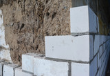 Bricklaying, Brickwork. Bricklaying on House Construction Site from White Bricks
