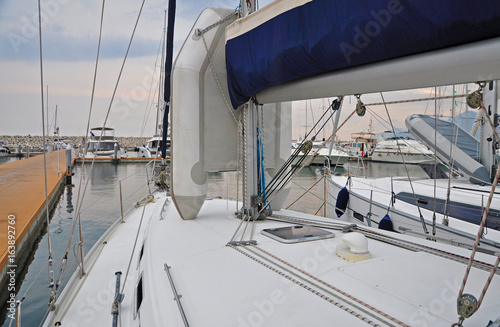 Yacht on the background of the Marina in Salerno © Antonina