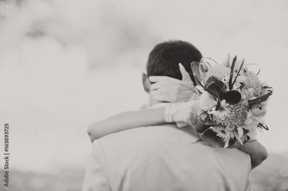 Bride holding big wedding bouquet on wedding ceremony Bride holding big wedding bouquet on wedding ceremony