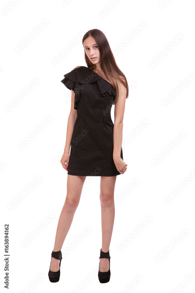 young woman in tight black dress on white background young woman in tight black dress on white background