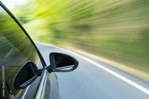 car driving with green motion blur
