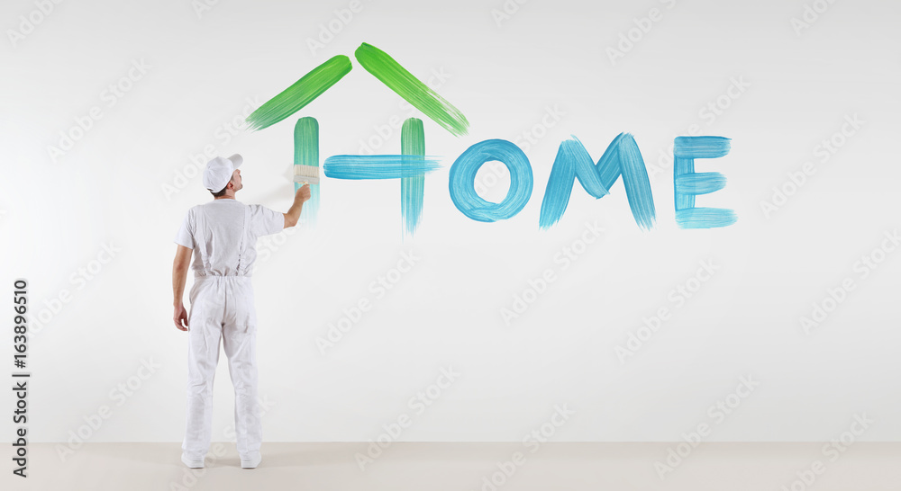 painter man with paint brush painting home text word isolated on blank white wall background, ecology concept painter man with paint brush painting home text word isolated on blank white wall background, ecology concept