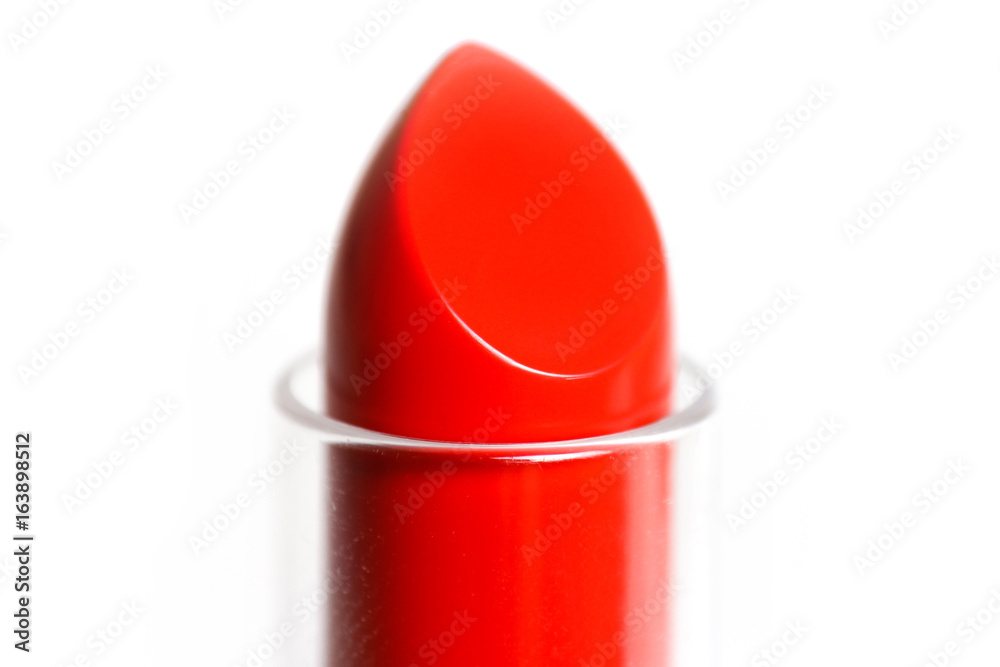 The tip of the red lipstick. Macro. Closeup. Isolated on a white background The tip of the red lipstick. Macro. Closeup. Isolated on a white background