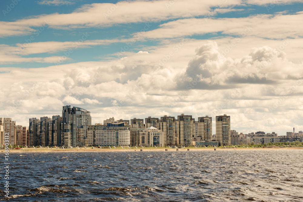 St. Petersburg, Russia - June 28, 2017: panoramic view from the bay to the embankment in St. Petersburg. St. Petersburg, Russia - June 28, 2017: panoramic view from the bay to the embankment in St. Petersburg.
