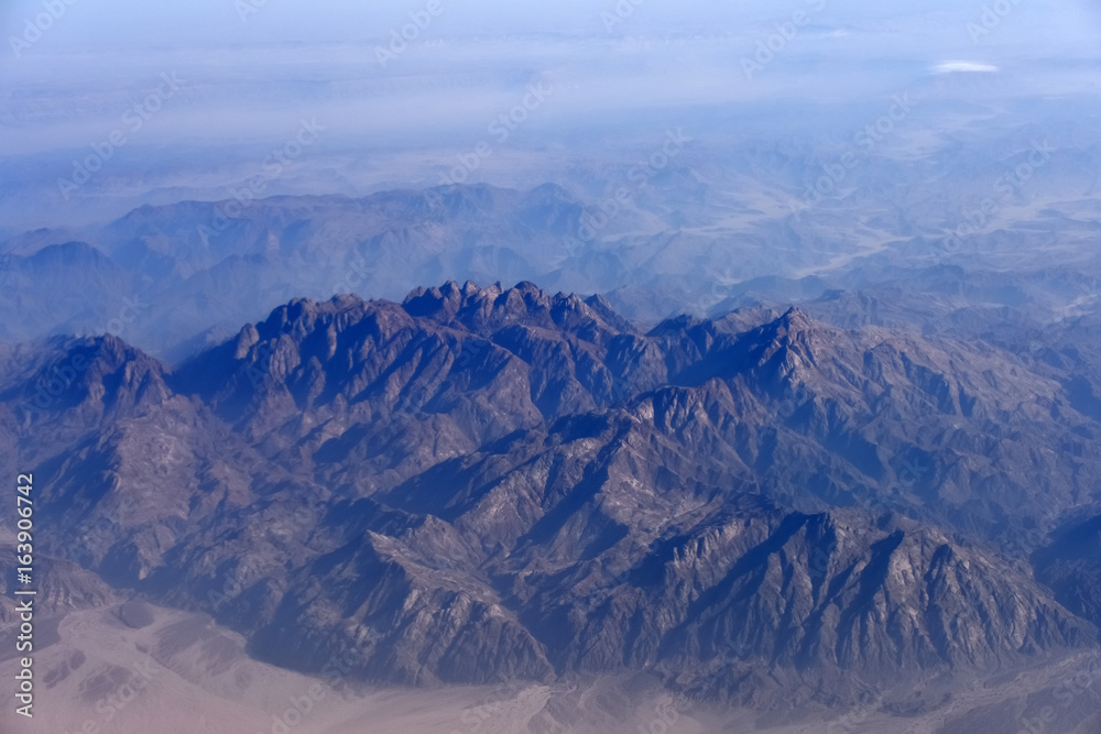 Mountains aerial view from airplane flight Mountains aerial view from airplane flight