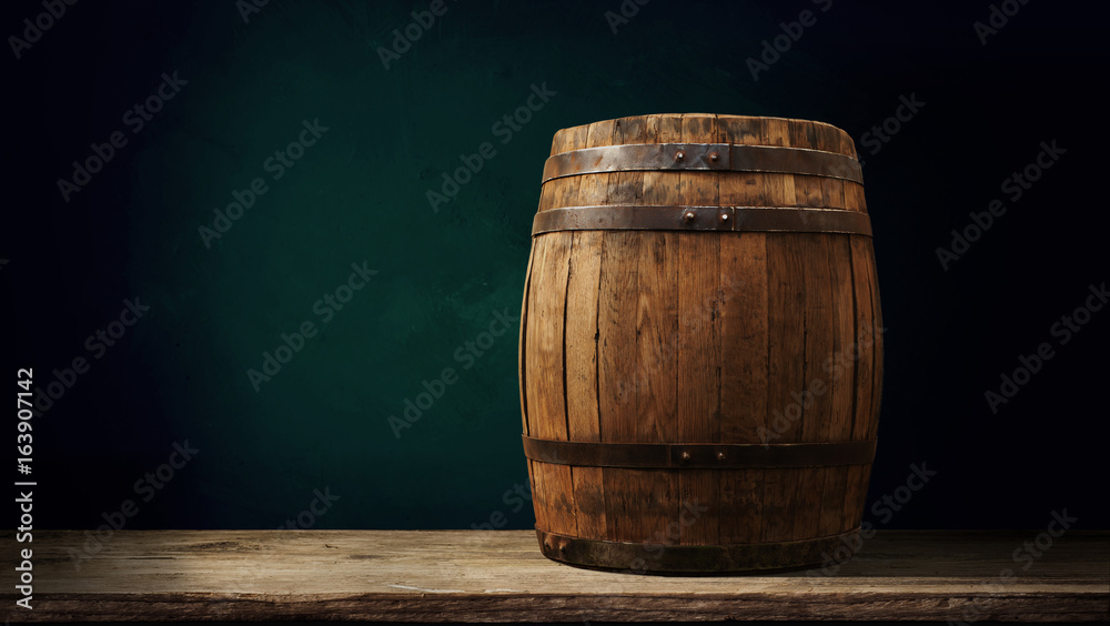 Red wine with barrel on vineyard in green Tuscany, Italy Red wine with barrel on vineyard in green Tuscany, Italy