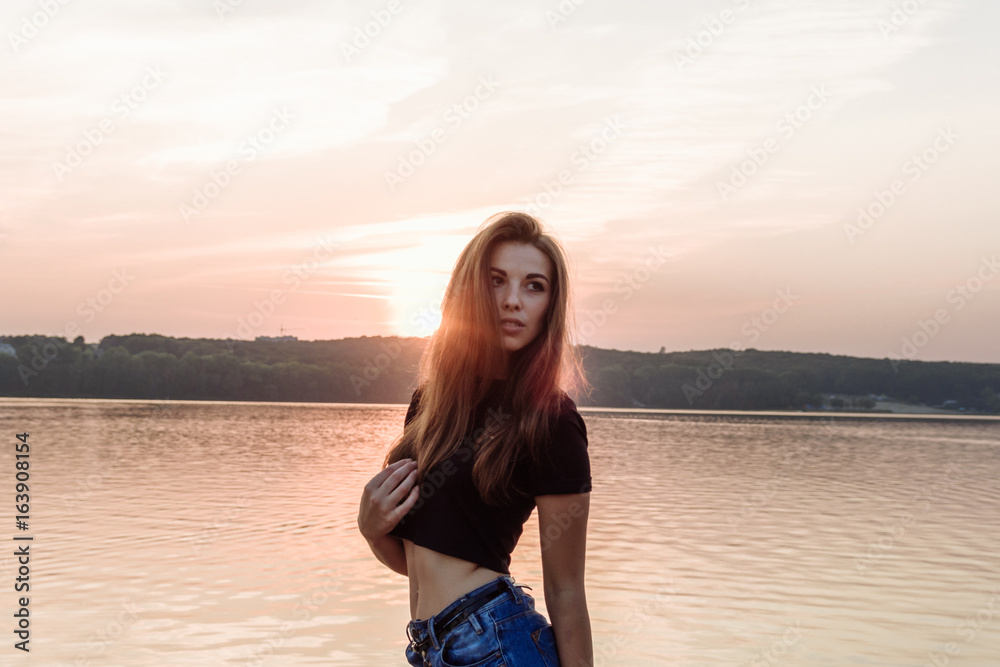 Summer spring portrait of young beautiful woman smile in the park sunset Summer spring portrait of young beautiful woman smile in the park sunset