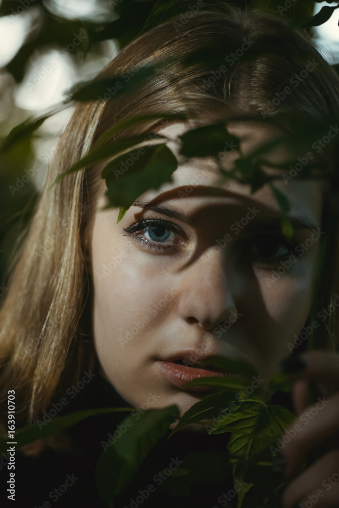 Portrait of a girl with tree branch Portrait of a girl with tree branch