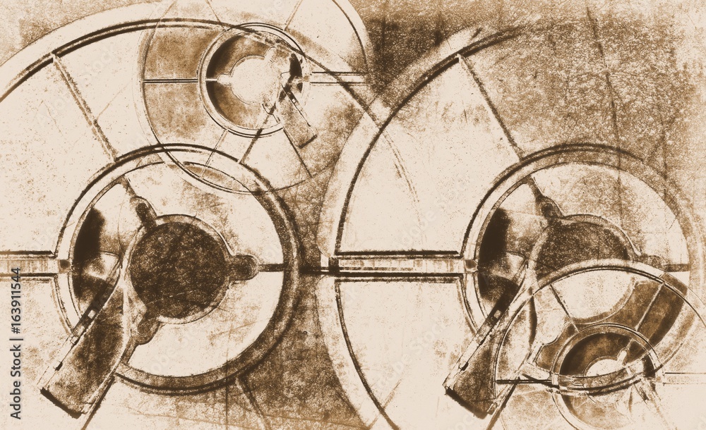 Fototapeta premium Old sepia film reel on a scratched and rusty metal background.