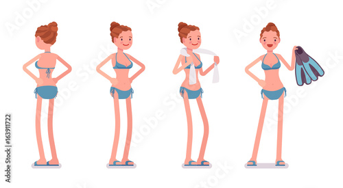 Standing young woman with towel and flippers set