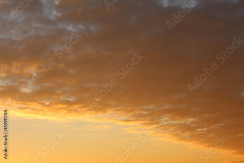 Fototapeta Naklejka Na Ścianę i Meble -  Yellow clouds sunset