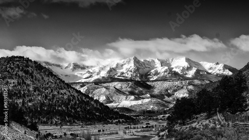 Black and white landscape of snow covered mountain peaks in Colorado