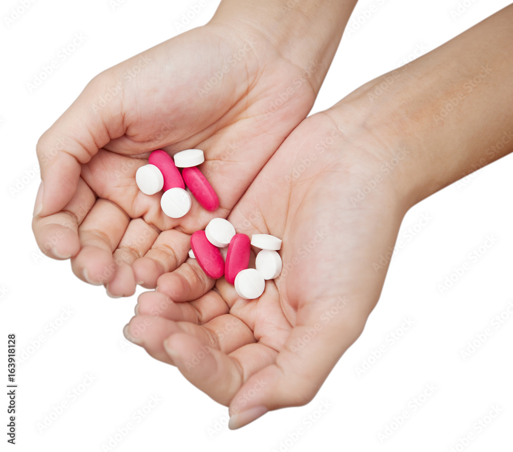 hands holding bunch of pills is on white background with clipping path , overdose concept