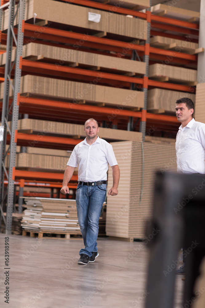 Fototapeta premium designers in their furniture manufacturing workshop