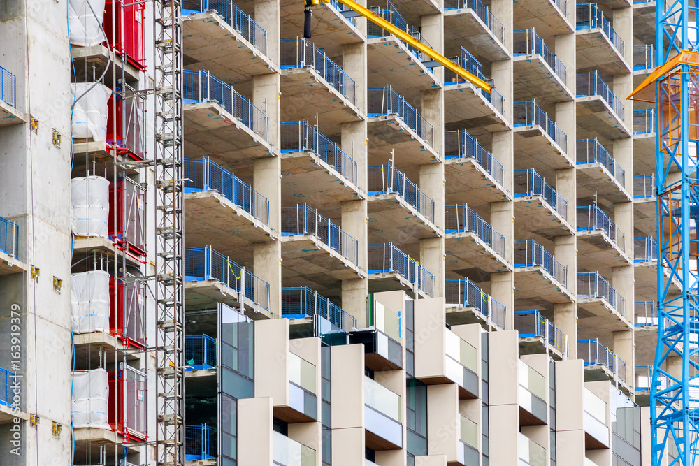Facade of a construction site in north Greenwich, London Facade of a construction site in north Greenwich, London