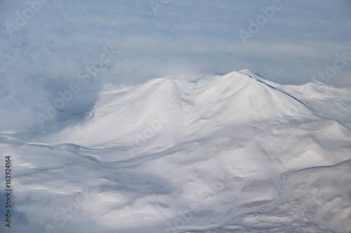 Snow-covered mountains of the Caucasus Mountains and Elbrus, the view from the heights