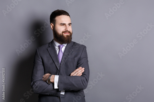Handsome confident bearded businessman portrait