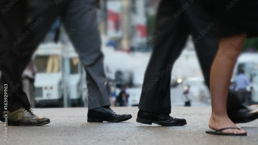 crowd of people commuting in the city. pedestrians walking on crowded street at rush hour time crowd of people commuting in the city. pedestrians walking on crowded street at rush hour time