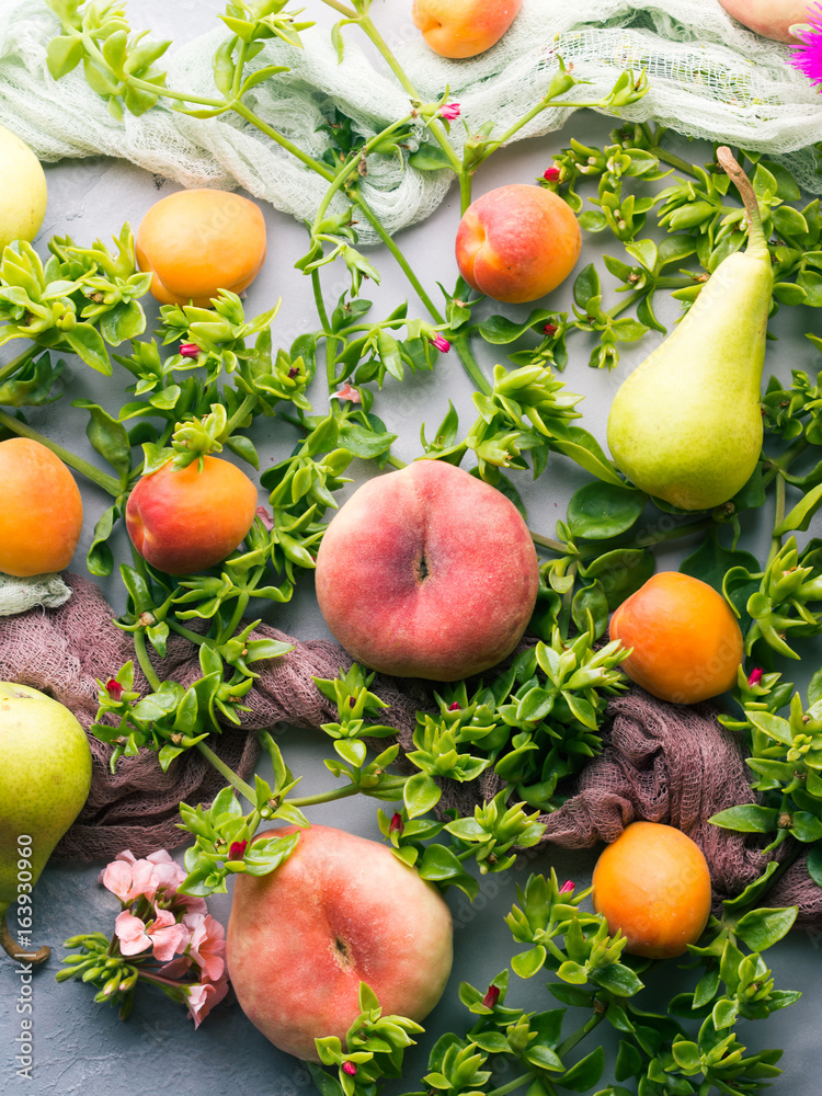 Fresh summer fruit concept still life - peaches, apricots and pears Fresh summer fruit concept still life - peaches, apricots and pears