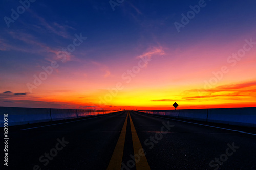 The evening sun on the road in Thailand. © MAGNIFIER