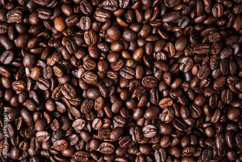 Texture of roasted ready to drink coffee close-up.Coffee Bean Scene.BlackGround Coffee.