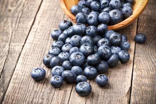 Fresh blueberries on wooden board