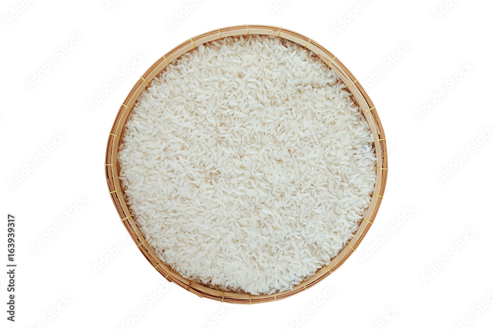 Jasmine rice grain on bamboo basket isolated on white background Jasmine rice grain on bamboo basket isolated on white background