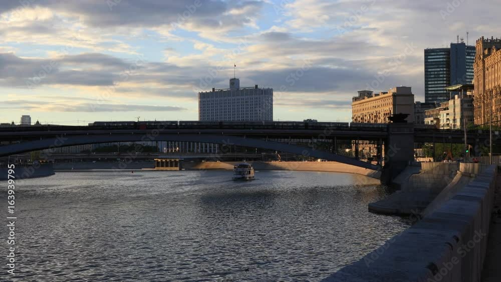 View of the Moscow river to the House of the Government of the Russian Federation in the rays of the setting sun
View of the Moscow river to the House of the Government of the Russian Federation in the rays of the setting sun