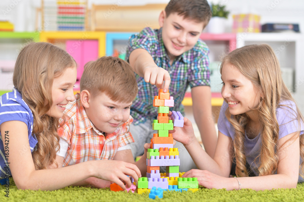 Group of children playing together Group of children playing together