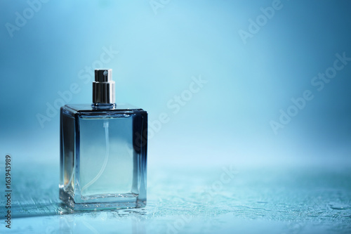 Wallpaper Mural Bottle of modern male perfume on color background Torontodigital.ca