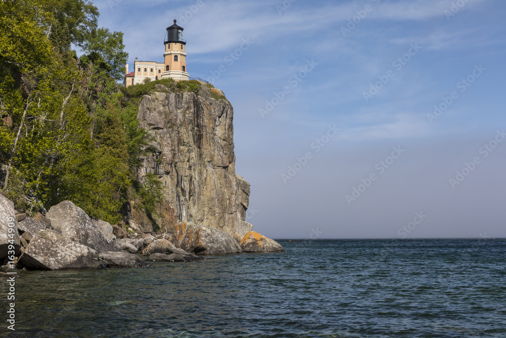 Split Rock Lighthouse / A lighthouse on a cliff along Lake Superior.