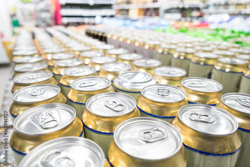 Shelves with goods in supermarket