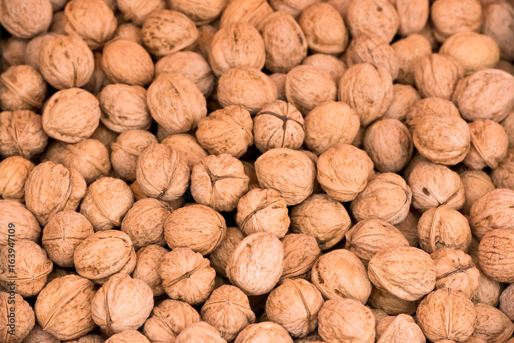 Whole walnuts background texture Whole walnuts background texture