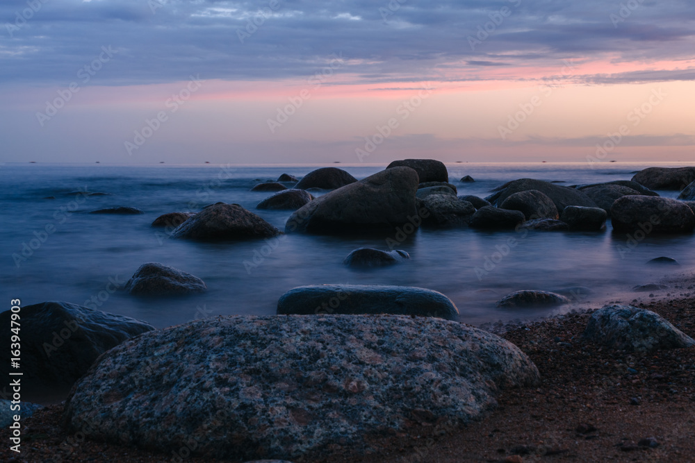 Stone beach sea on a long exposure