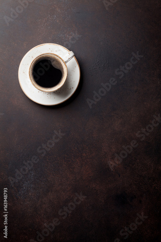 Coffee cup on old kitchen table