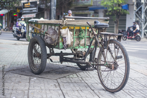 Antique old cargo bicycles, cargo tricycles.