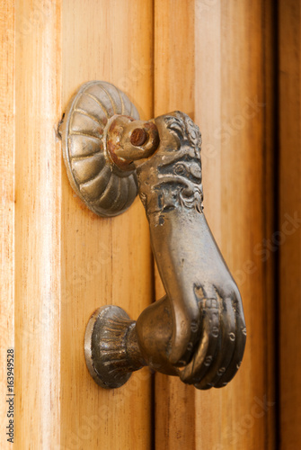 Metal knocker old door Antigua Guatemala wooden