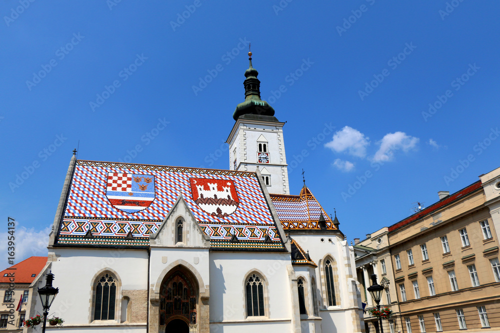 The Church of St. Mark, historic church in St. Mark's Square, in Zagreb, Croatia. Roof tiles represent the coat of arms of Zagreb and Triune Kingdom of Croatia, Slavonia and Dalmatia.