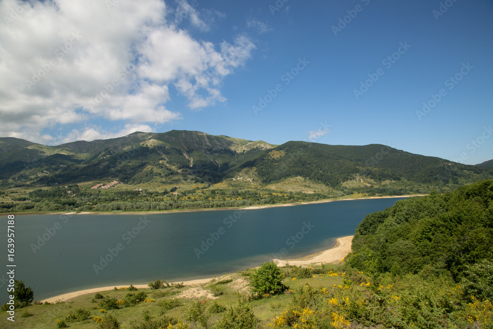 Lake Campotosto, overlooking Colle Del Vento, National Park Gran Sasso and Monti della Laga, early summer