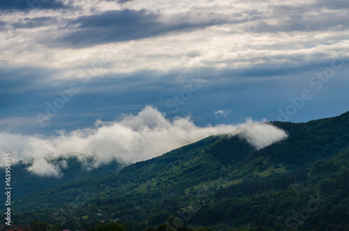 Ukrainian carpathian mountaine landscape with fog